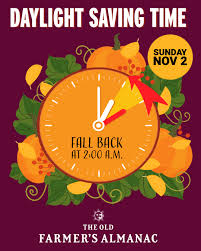 Graphic announcing Daylight Saving Time with a clock and autumn leaves, stating to "fall back" at 2:00 AM on November 2.