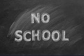 Black chalkboard with the words "NO SCHOOL" written in white chalk.